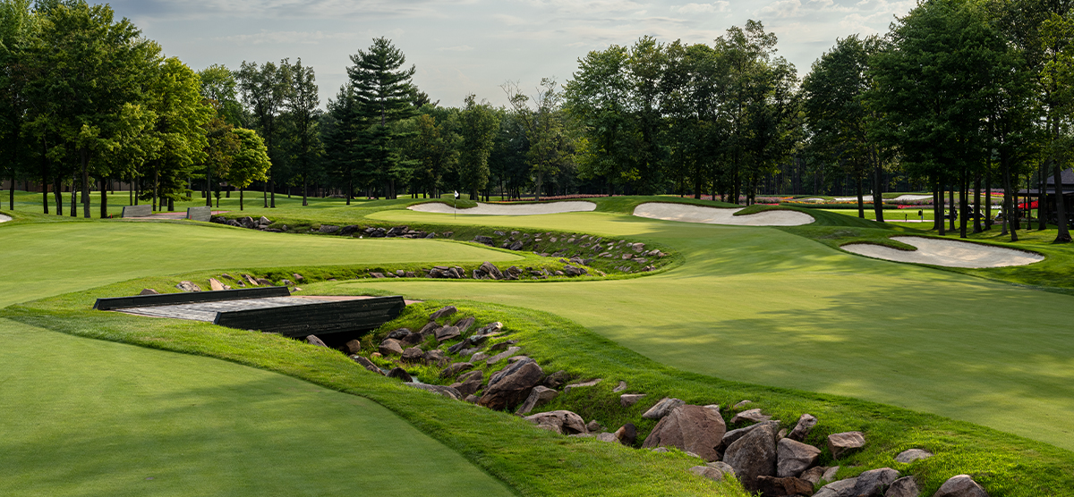 Rock and water hazard along the ninth hole fairway at SentryWorld