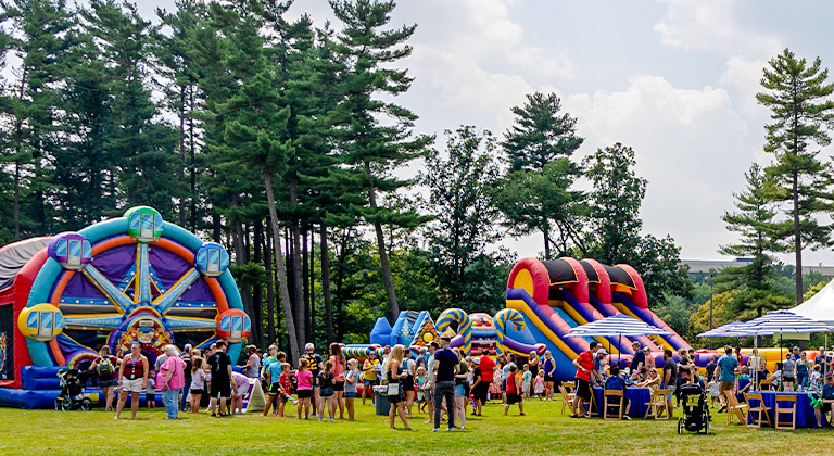 Associates attending a summer celebration for Sentry families.