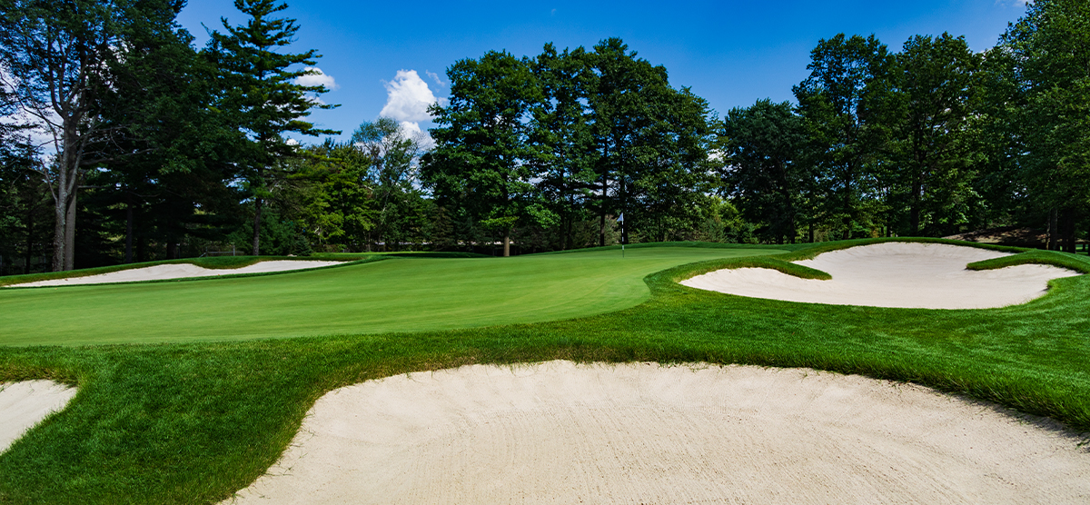 Sand traps along the tenth hole fairway and putting green at SentryWorld