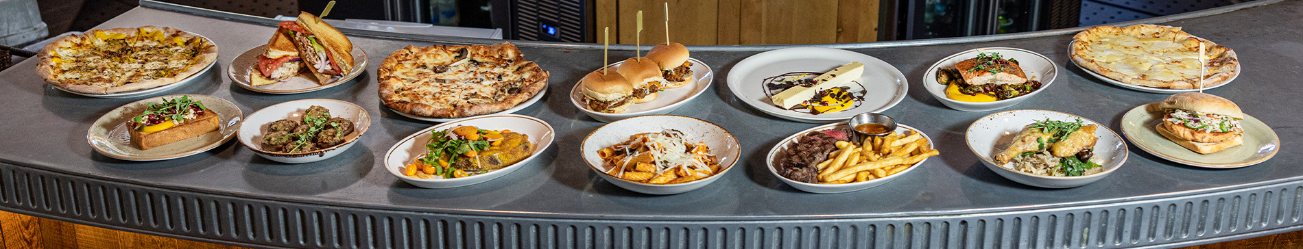 PJs menu items laid out on the bar table