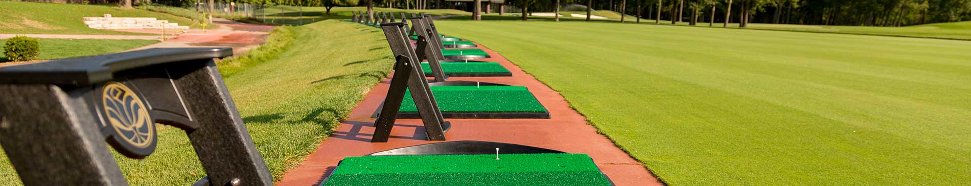 Practice mats at the driving range on the SentryWorld golf course