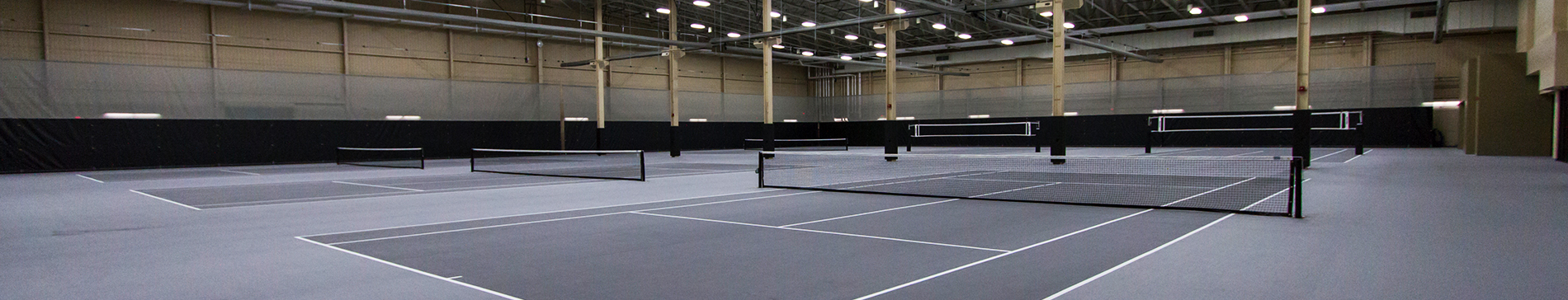 Tennis courts in the fieldhouse at SentryWorld