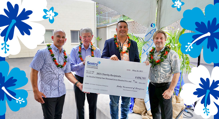 Sentry CEO Pete McPartland gives donation check to local organizations in Maui