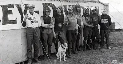 Harley-Davidson riders with a dog