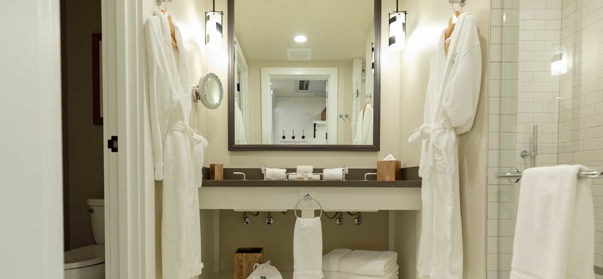 Bathroom with robes and towels in The Inn at SentryWorld