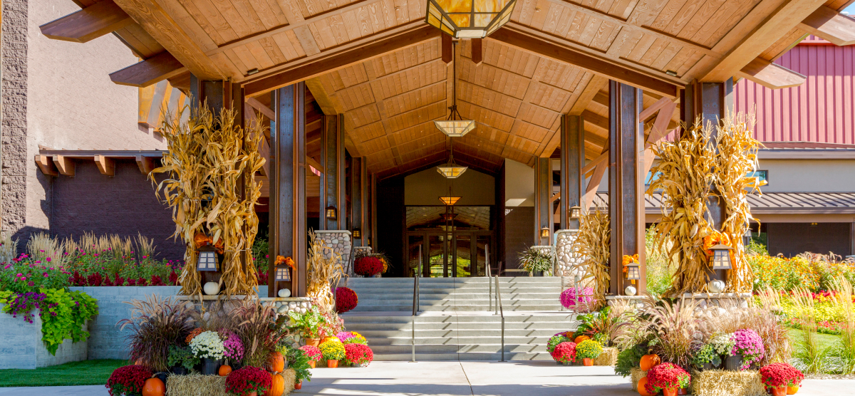 carousel-corporate-event-sw-3-1200x556 Exterior entrance of SentryWorld during the Fall.