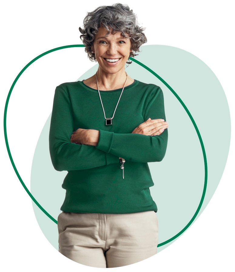 Confident smiling woman in a green shirt