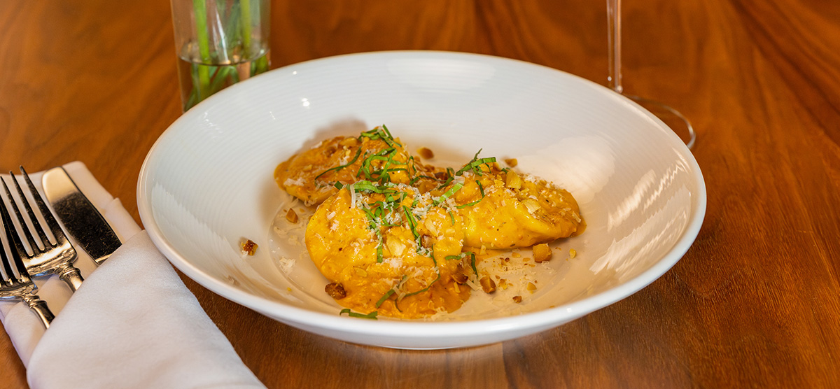 Plate of smoked goat cheese tortellacci. 