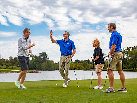Sentry associates golfing at SentryWorld.