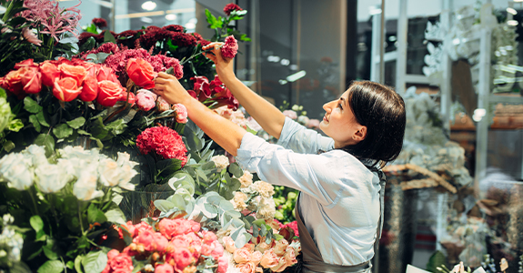 florist assembling flowers