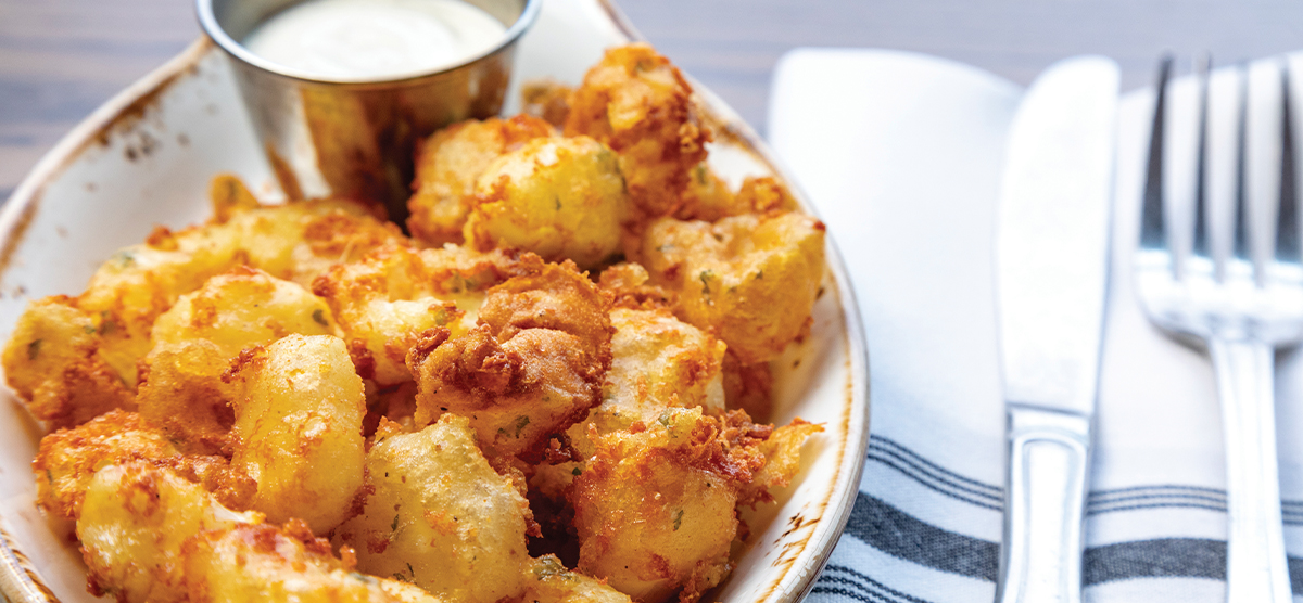 Cheese curds on a plate at PJ's - SentryWorld