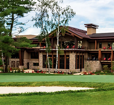 Back porch of The Inn at SentryWorld from the golf course