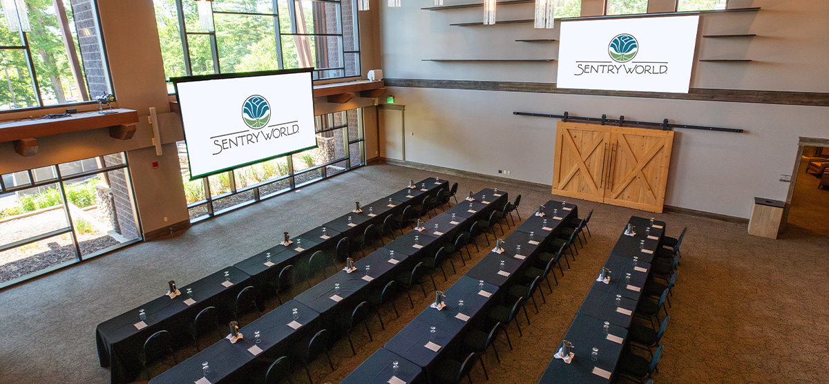 Aerial view of event tables in the Atrium at SentryWorld