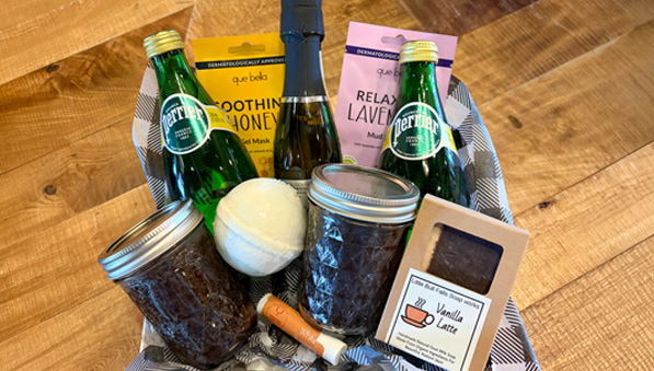 50-50-spring-inn-getaway-basket-597x339 Basket of drinks and bath supplies.