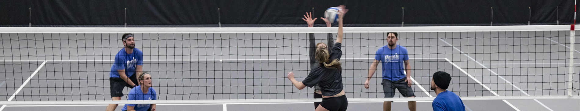 A volleyball game in the fieldhouse at SentryWorld