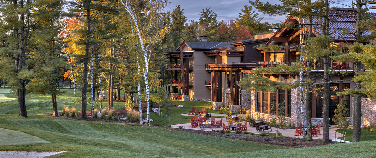 Outdoor patio behind The Inn at SentryWorld next to the golf course