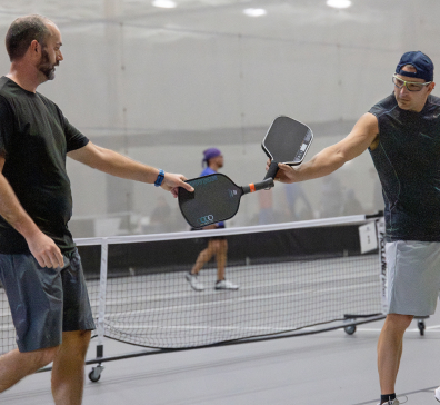 Two pickleball players at SentryWorld.