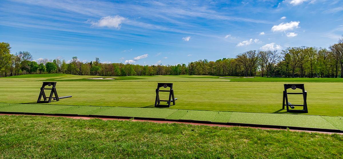 Practice mats outside at the SentryWorld driving range