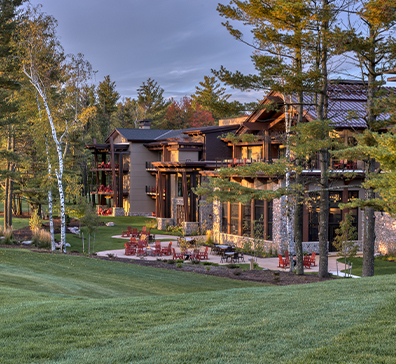 View of the back porch area of The Inn at SentryWorld from the golf course