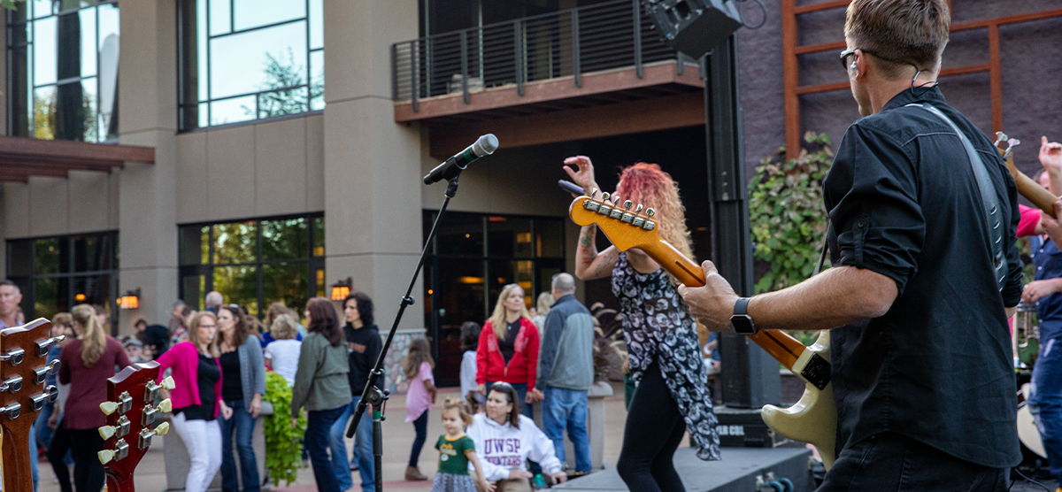 People outside PJ's enjoying PJ's Live concert