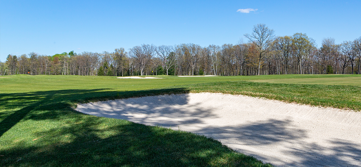 Sand trap placed alongside the SentryWorld driving range