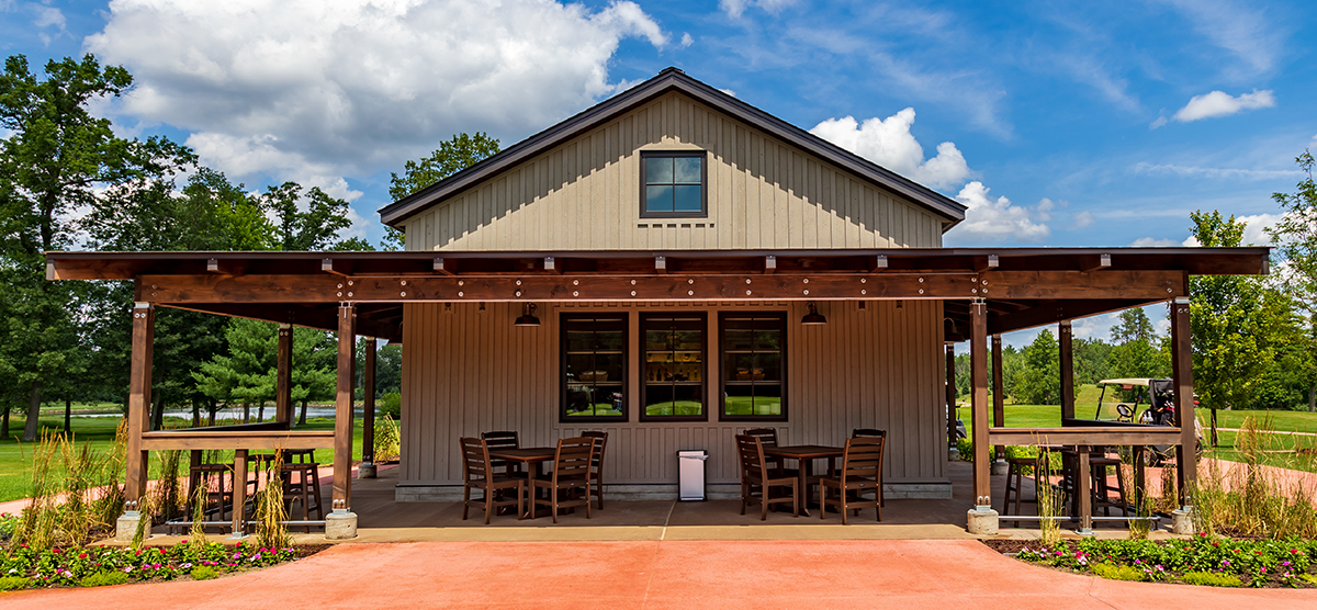 Outside seating area at the refreshment station on the SentryWorld golf course