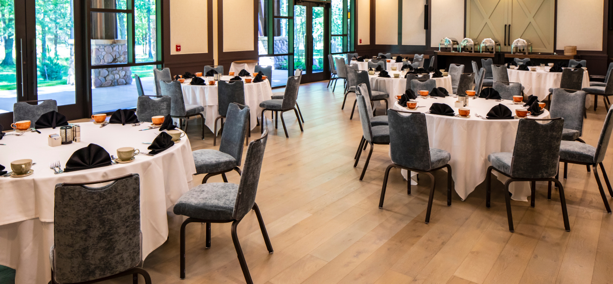 carousel-corporate-event-spaces-5-1200x556 Tables set in The Inn meeting rooms for an event.