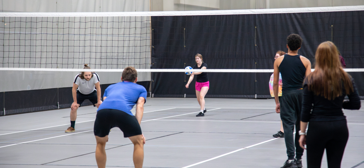 carousel-fall-league-signup-volleyball-2-1200x556 Players play volleyball at the SentryWorld fieldhouse.