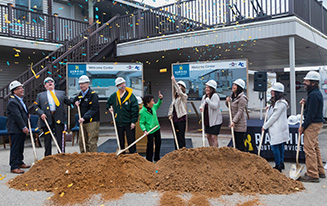 Group celebrating ground breaking at Rawhide Youth Services