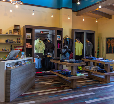 hero-lodging-amenities-396x364 The Inn pro shop clothing display.