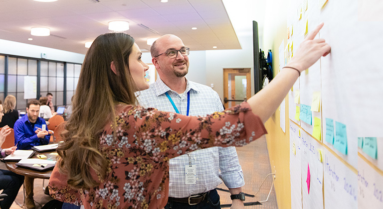 Two people collaborating 