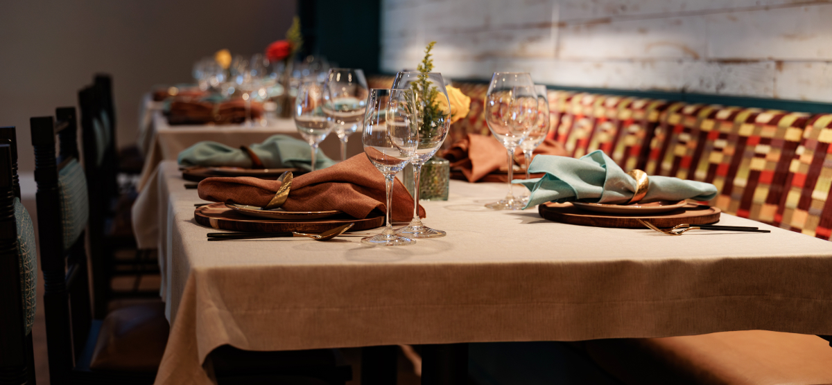 carousel-corporate-event-full-day-5-1200x556 Table set at The Library for dinner.