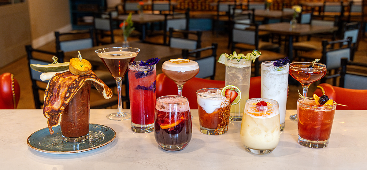 carousel-amenities-cafe-7-bar-drinks-1200x556 Drinks sitting on the Library Cafe bar.