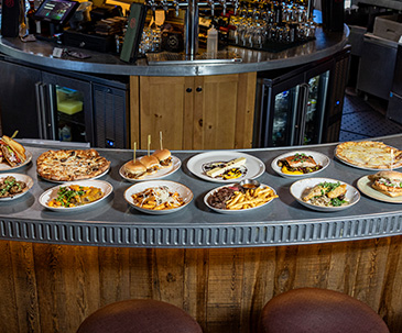 PJs menu items laid out on the bar table