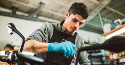 Man working on motorcycle