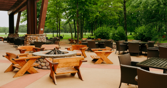 Outdoor seating around firepits and tables. 