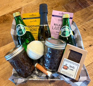 Basket of drinks and bath supplies. 