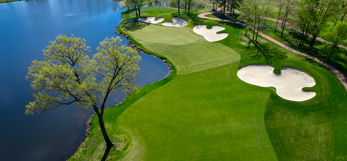 Aerial view of the fairway and putting green on the fifth hole at SentryWorld