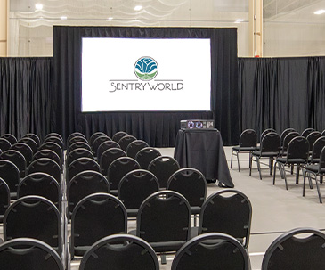 SentryWorld Fieldhouse set up for a corporate meeting