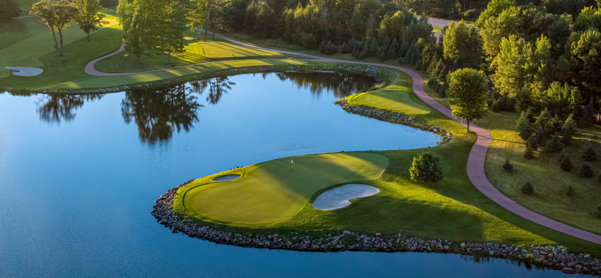 carousel-course-renovation-2-1200x556-05 The lake and hole 12 green at SentryWorld.