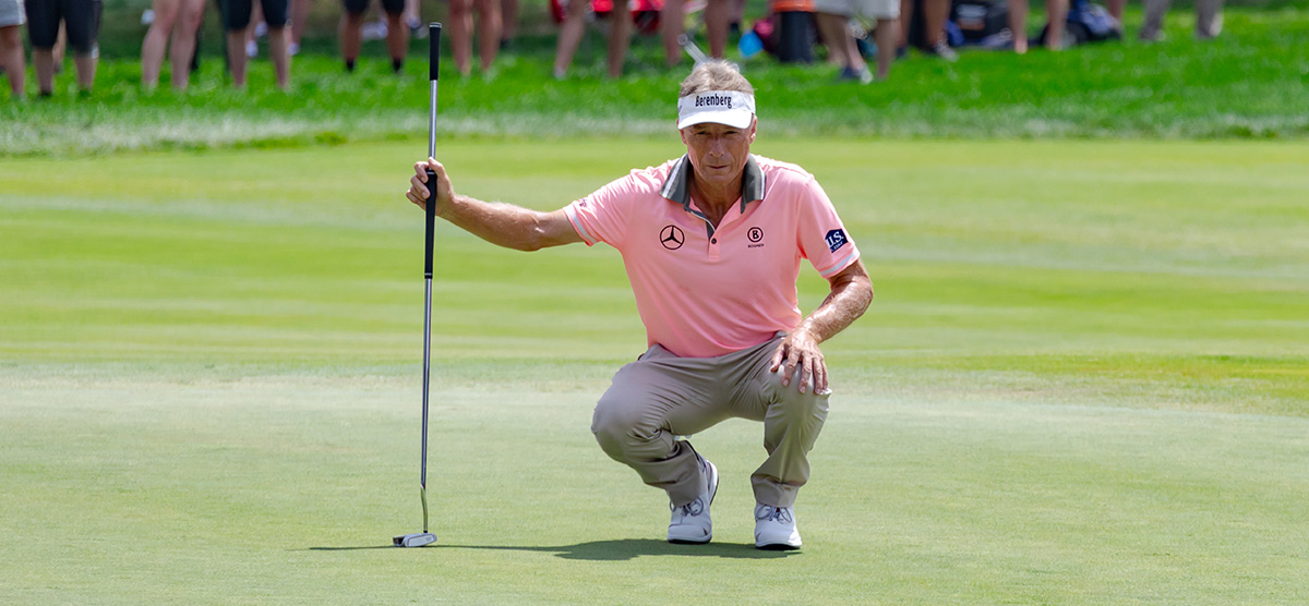 Bernhard Langer lining a putt up at the U.S. Senior Open at SentryWorld