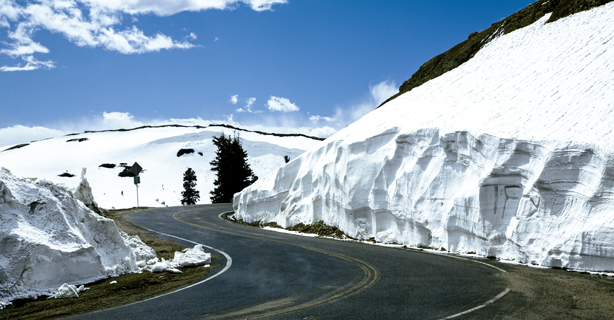 Winding road between snow