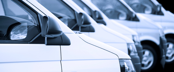 Commercial vehicles parked in a row