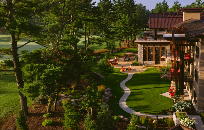 Back exterior view of The Inn at SentryWorld and hole 18. 