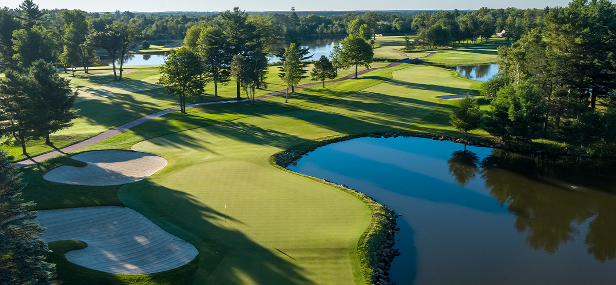 Aerial view of the putting green on the fourth hole at the SentryWorld golf course