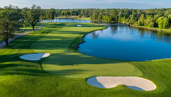 50-50-stay-play-aerial-hole13-597x339 Aerial photo of Hole 13 at SentryWorld golf course.