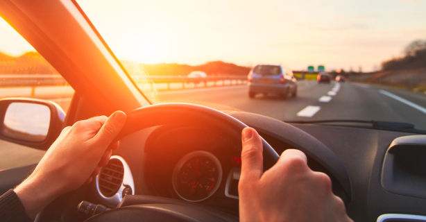 Person driving car on highway