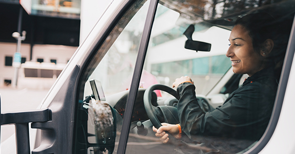 woman driving fleet van