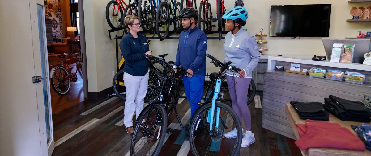 People renting bikes in the Outfitter