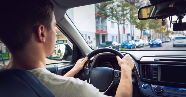 Teen driving car